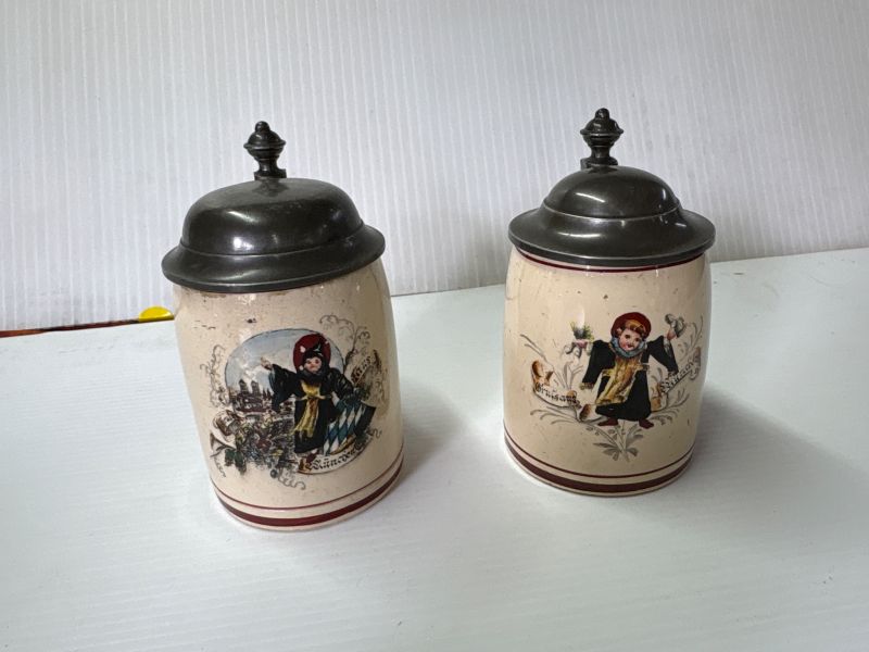 Two 1/8th litre German small Steins