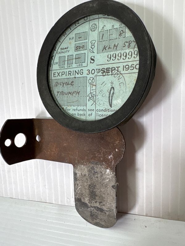 Vintage British 1950 road tax on mount